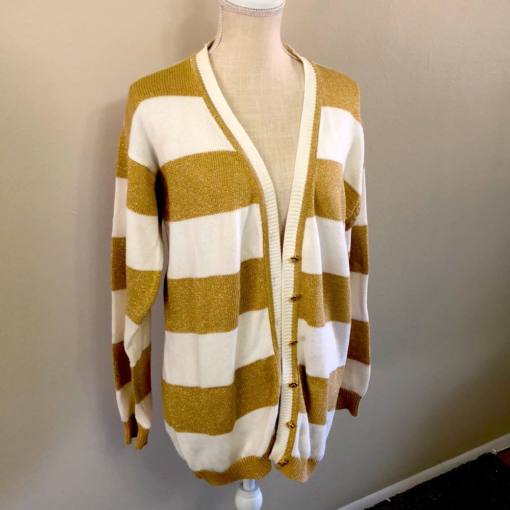 Gold and white v-neck, button down cardigan buttons. 89% cotton. Dry clean.